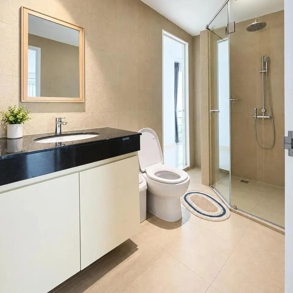 The same bathroom after editing: a clean frame and even light